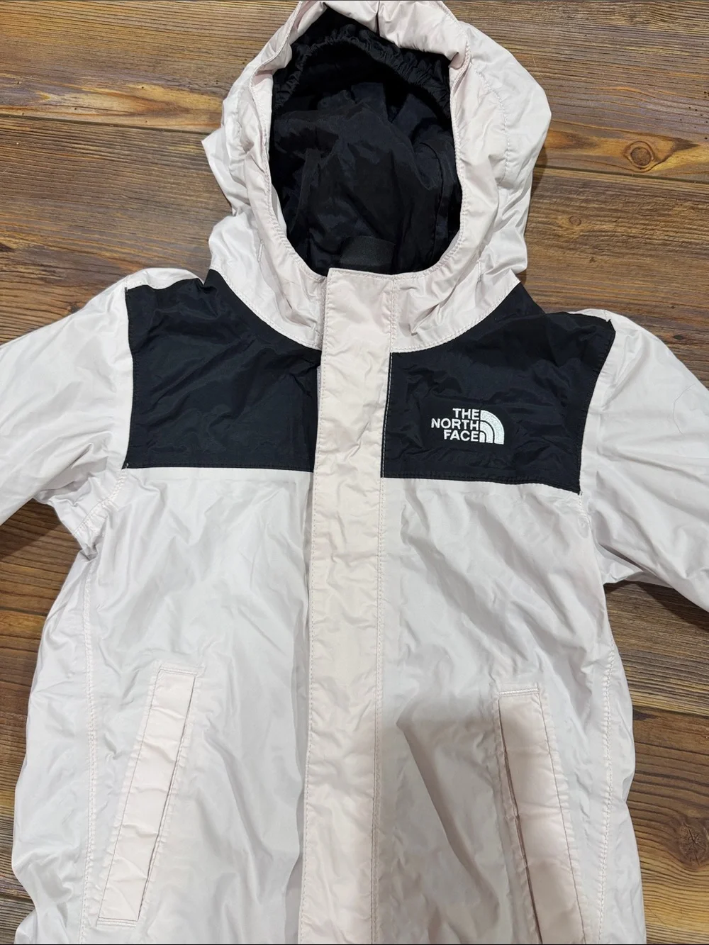 The North Face Kids Hooded Rain Jacket in Light Pink and Black